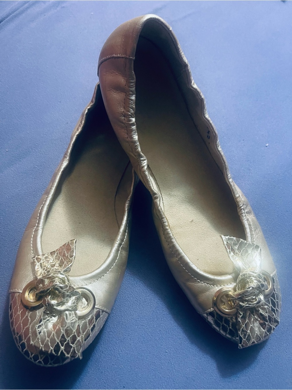 Stuart Weitzman Metallic Gold Ballet Flats with Bow Accent